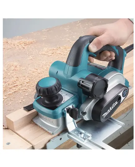 Рубанок MAKITA KP0810C, 1050 Вт, 12000 об\м, шир. 82 мм, глуб. 0-4 мм, 3.3 кг, изображение 13