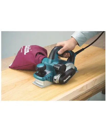 Рубанок MAKITA KP0810C, 1050 Вт, 12000 об\м, шир. 82 мм, глуб. 0-4 мм, 3.3 кг, изображение 12